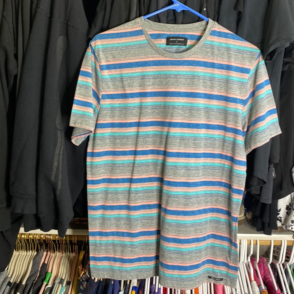 Ocean current brand tee with grey and pastel stripe pattern. Size male large